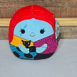 The Night Before Christmas Squishmallow featuring Sally in her patchwork dress